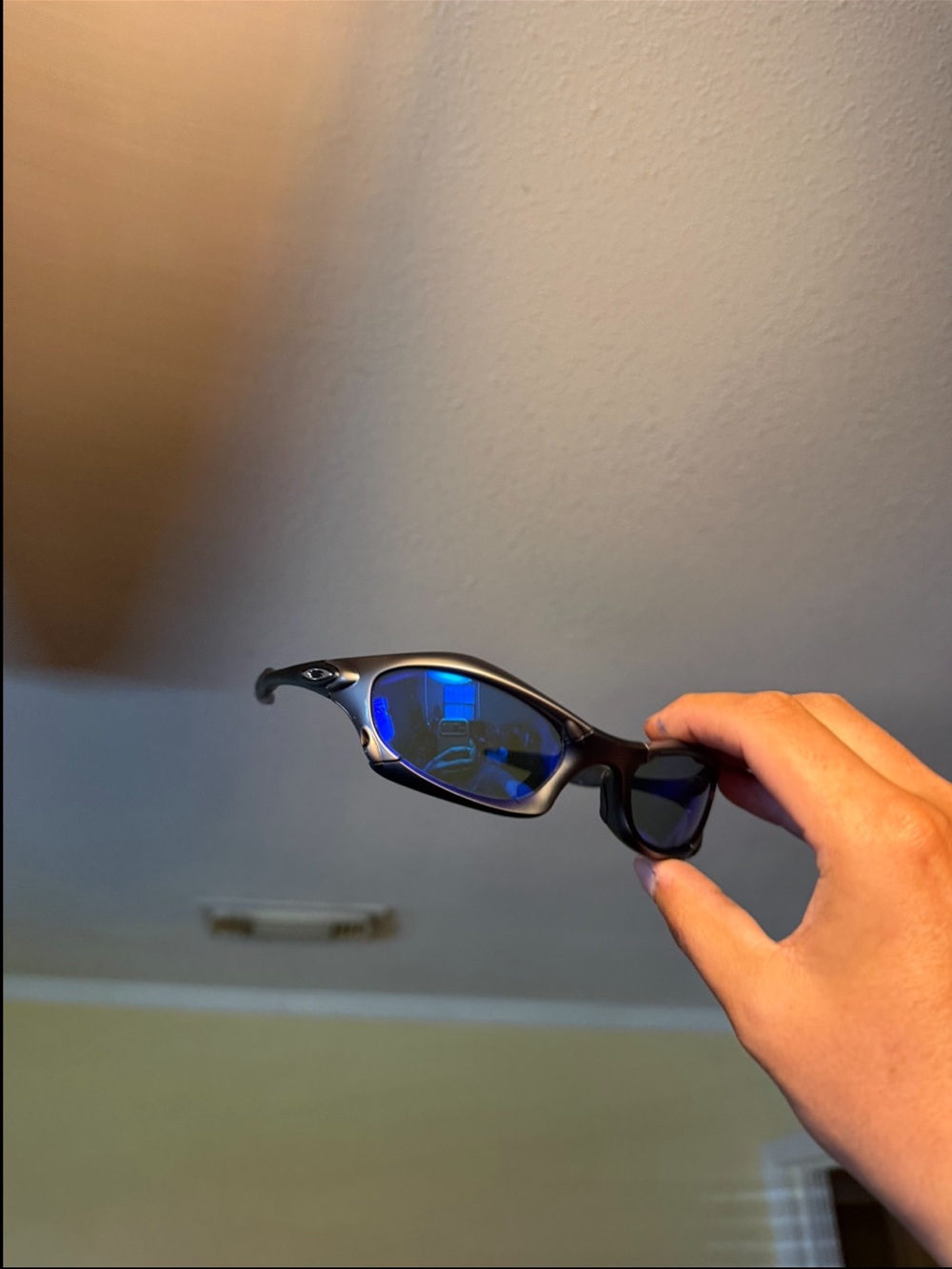 Women's Black Sunglasses with Blue Mirrored Lenses Oakleys